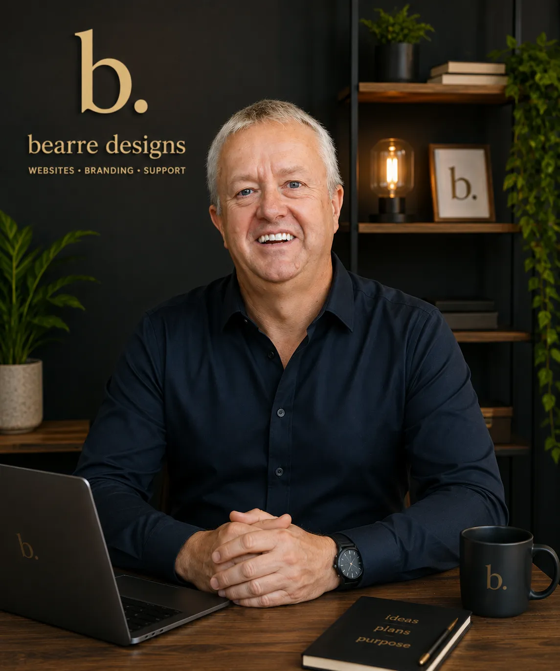 David Charles, founder of Bearre Designs, at his desk in the studio